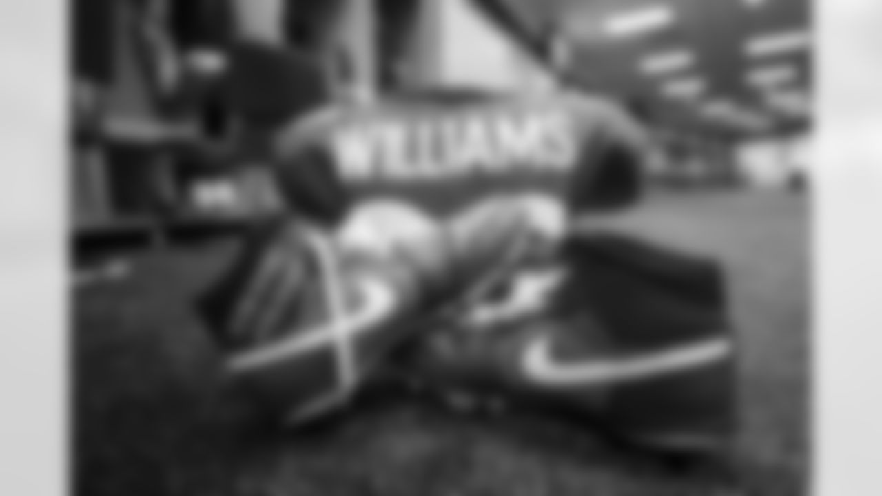 DeShawn Williams's cleats in the locker room before the Broncos' Week 3 game against the New York Jets at Empower Field at Mile High in Denver, Colorado on September 26, 2021. (Photo by Sam Weaver)