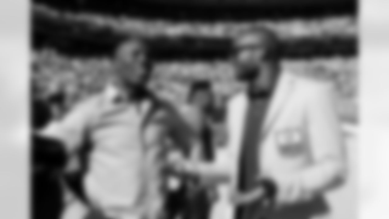 Terrell Davis talks with Champ Bailey before the game against the Las Vegas Raiders on Sunday, October 17, 2021 at Empower Field at Mile High in Denver, Colorado.
Photo by Gabriel Christus