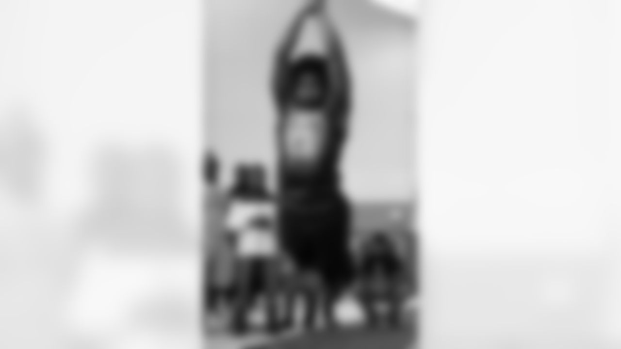 Linebacker Aaron Davis shows his athleticism for NFL scouts in a broad jump at Colorado State's Pro Day on March 11.