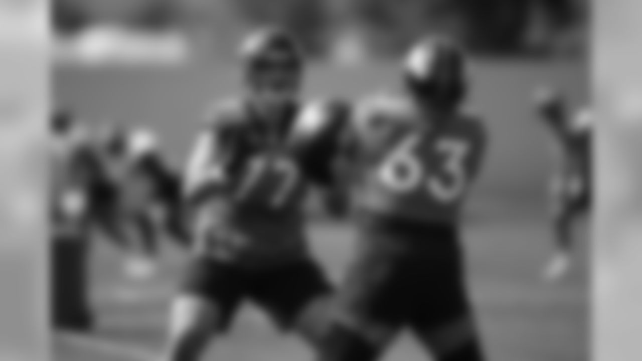 Hunter Watts and Tyler Jones run a drill during practice for early reports and a workout for other veterans at UCHealth Training Center on August 11, 2020. (Photo by Ben Swanson)