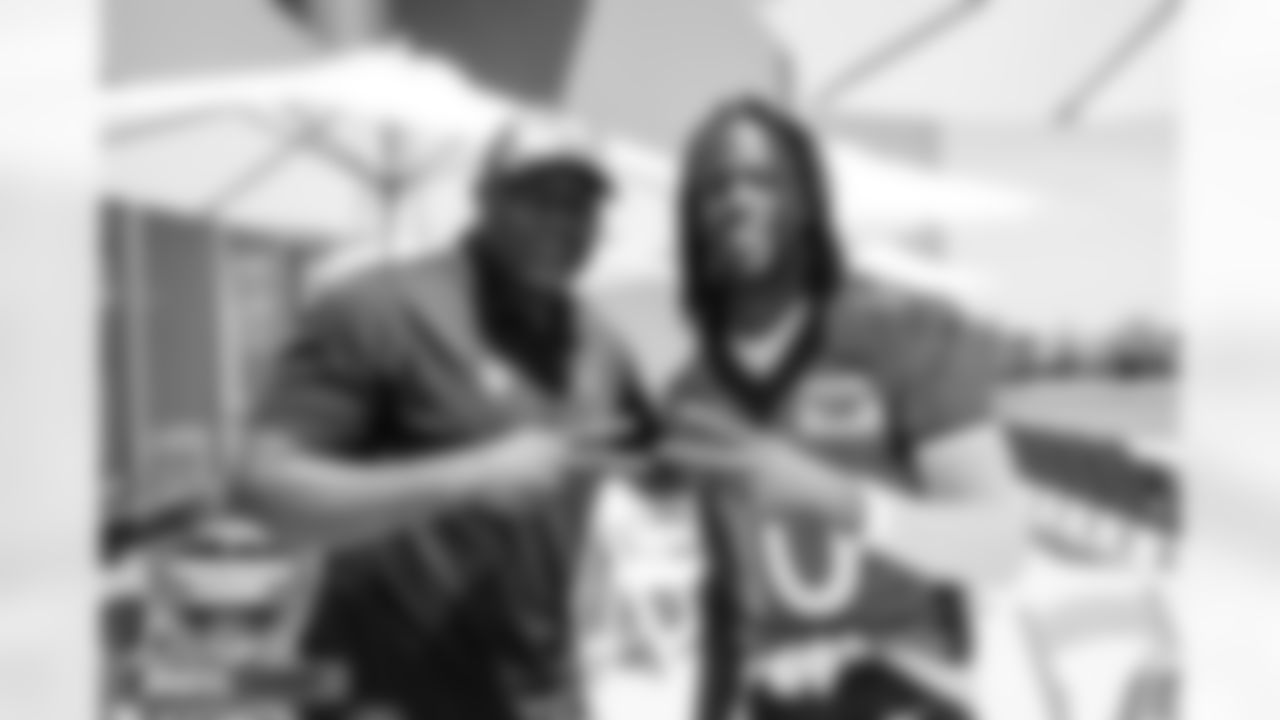 Jerry Jeudy and Rod Smith after practice on Day 1 of training camp at UCHealth Training Center in Englewood, Colorado on July 27, 2022. (Photo by Ben Swanson)
