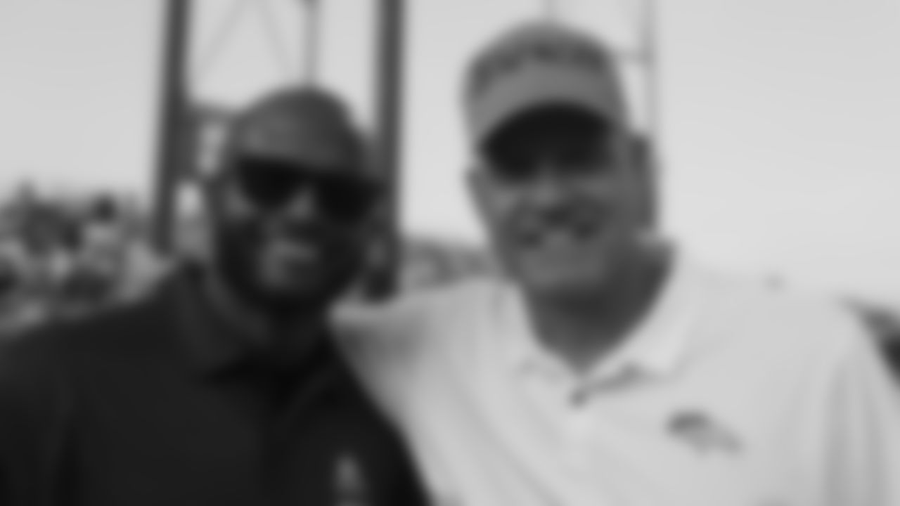 Champ Bailey with Defensive Coordinator Ed Donatell before the Broncos' preseason matchup with the Falcons in the Pro Football Hall of Fame Game on August 1, 2019 at Tom Benson Hall of Fame Stadium.