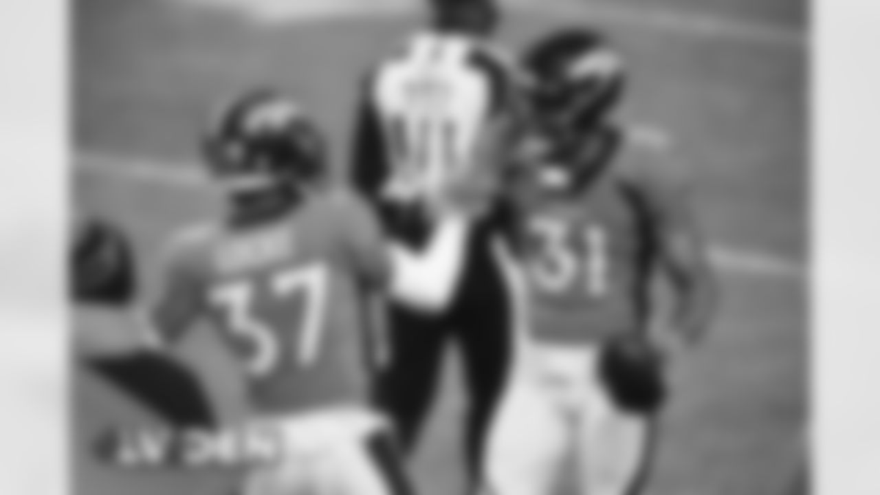 Denver Broncos safety Justin Simmons (31) and safety P.J. Locke (37) celebrate after an interception during the NFL preseason game against the Las Vegas Raiders at Empower Field at Mile High in Denver, Colorado, January 03, 2021.
Photo by Eric Bakke