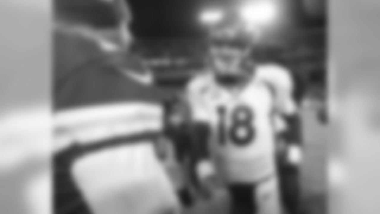 Alex Smith and Peyton Manning