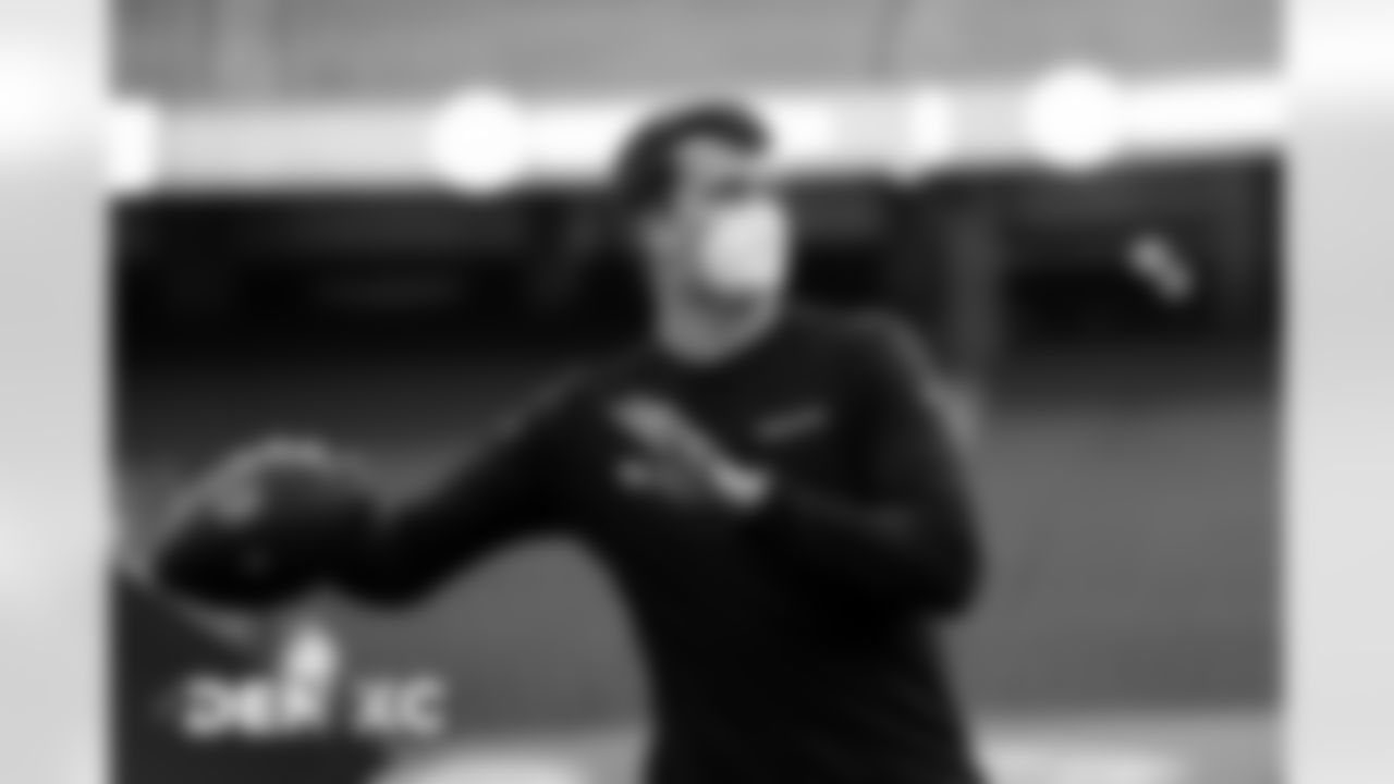 Drew Lock warms up before the Broncos' Week 13 game against the Kansas City Chiefs at Arrowhead Stadium in Kansas City, Missouri. (Photo by Gabriel Christus)