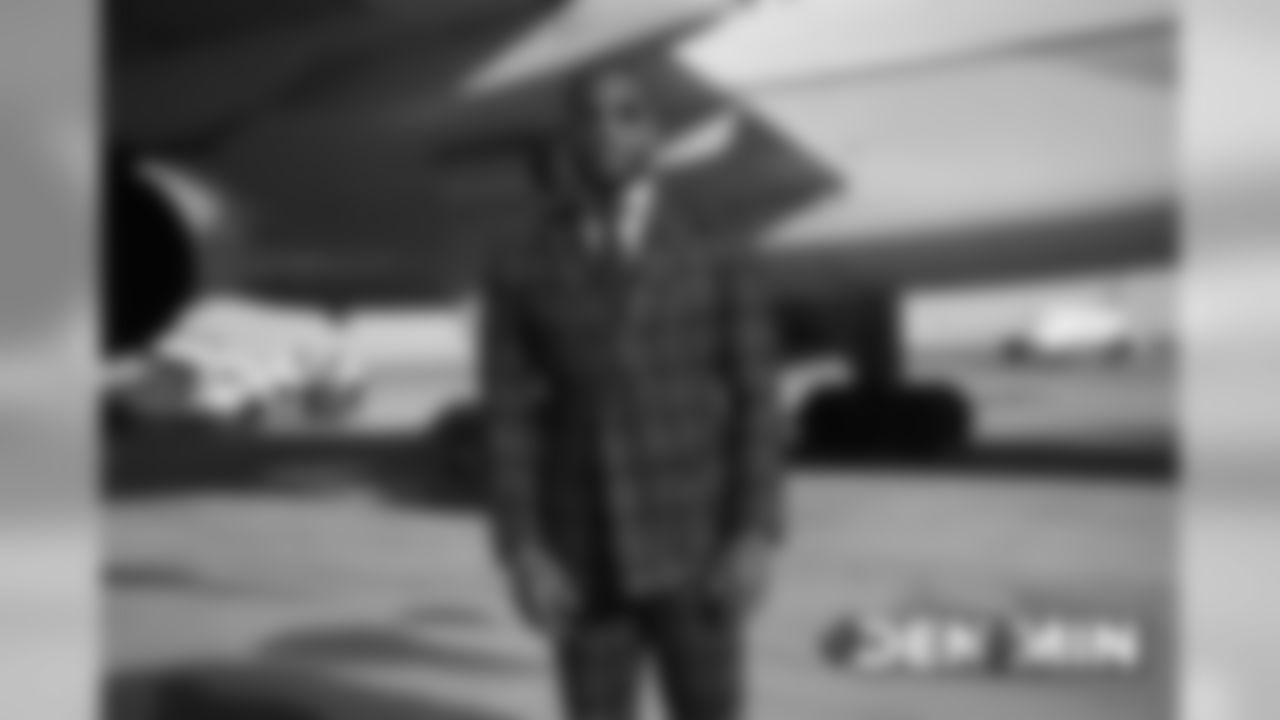 Kareem Jackson on the tarmac at Denver International Airport during the team's travel to Minnesota on November 16, 2019 to face the Vikings.. (Photo by Gabriel Christus)