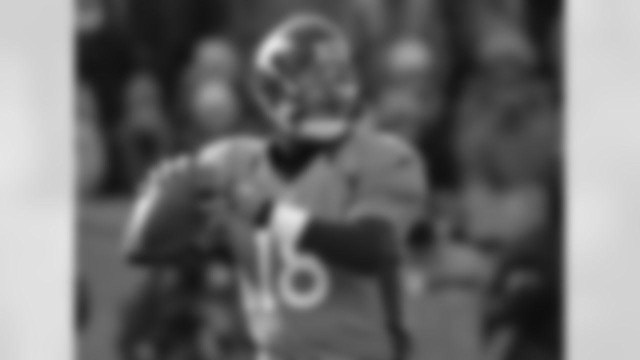 QB Peyton Manning drops back to pass against Baltimore.