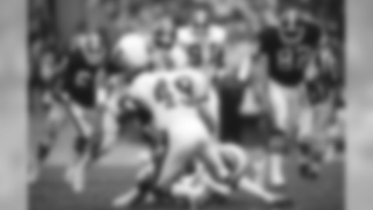 Dennis Smith and Rick Dennison of the Denver Broncos during the NFL game against the Cleveland Browns on October 10, 1989 at Cleveland Municipal Stadium in Cleveland, Ohio.
Photo by Eric Lars Bakke