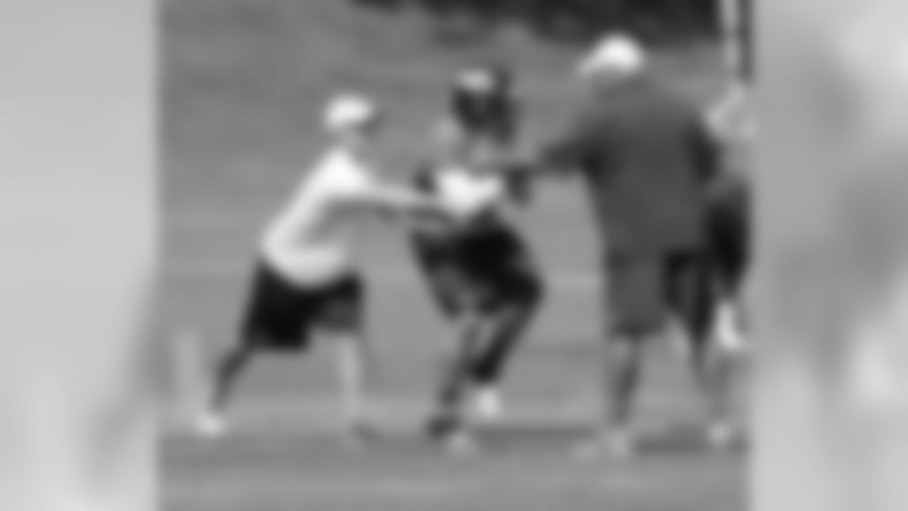 RB Lance Ball runs through a drill.