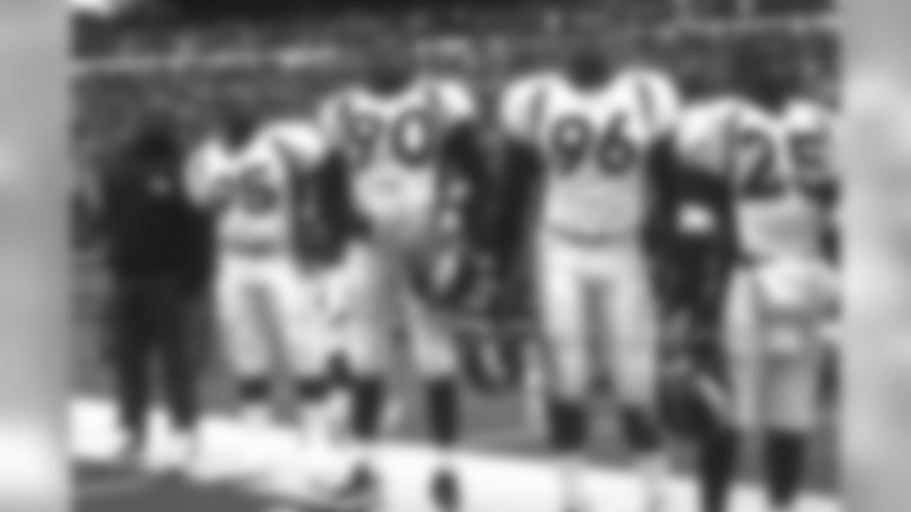 Buffalo: Michael Dean Perry, Neil Smith, Harald Hasselbach and Darrius Johnson stand for the national anthem against the Buffalo Bills at Rich Stadium in Orchard Park, NY on October 26, 1997.