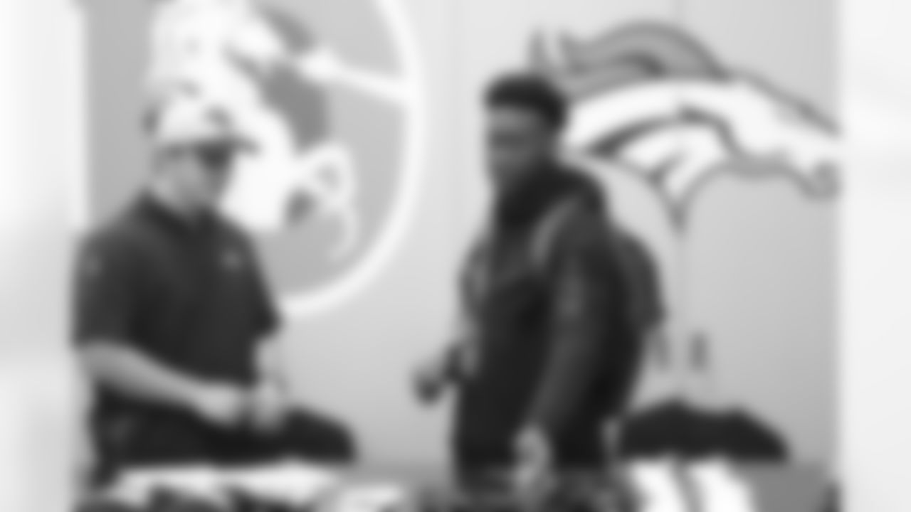 Garrett Lawrence and Delarrin Turner-Yell during the rookie equipment fitting on Thursday, May 12, 2022 at UCHealth Training Center in Englewood, Colorado.
Photo by Gabriel Christus