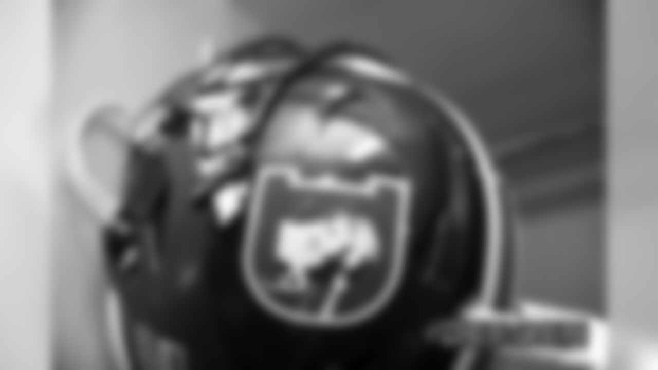 A helmet in the locker room before the Broncos' game against the Detroit Lions at Empower Field at Mile High on December 22, 2019. (Photo by Ben Swanson)