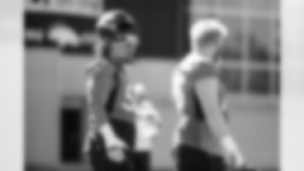Netane Muti and Quinn Bailey during the ninth day of OTA practices at UCHealth Training Center on June 9, 2021. (Photo by Ben Swanson)