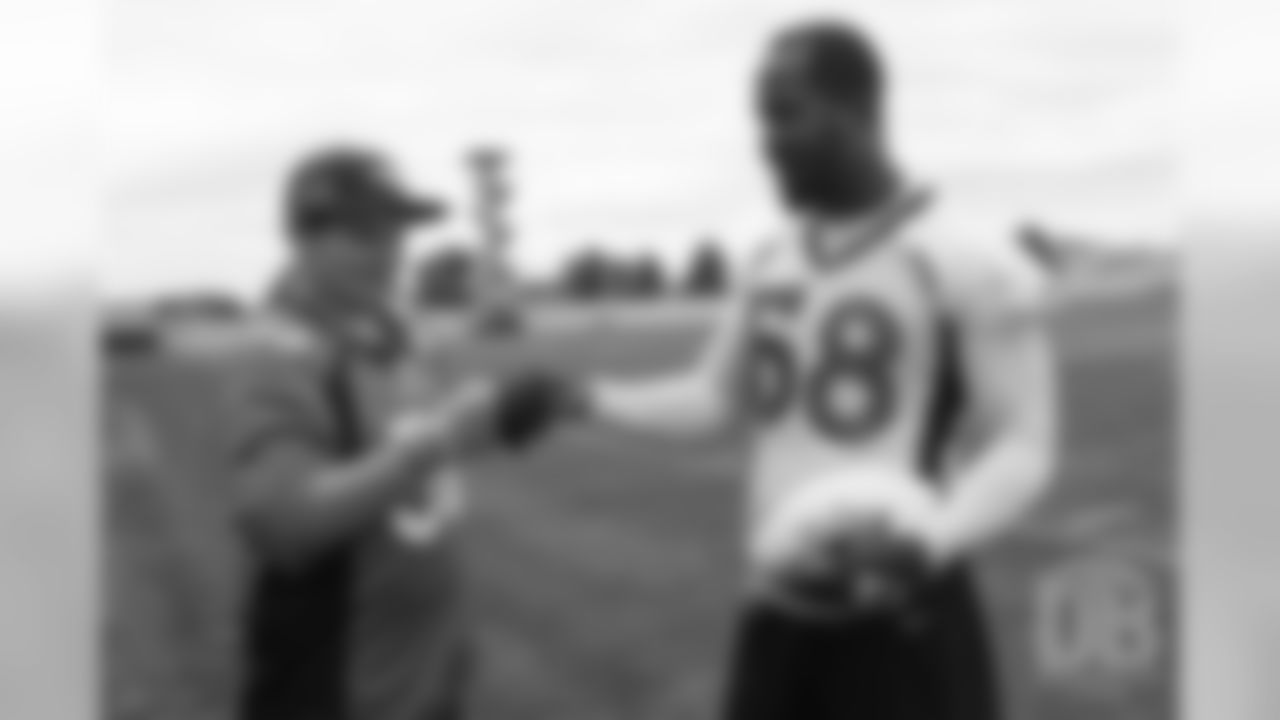 TJ, a 12-year-old fighting cystic fibrosis, wanted to be Von Miller for a day, and the Make-A-Wish Foundation helped make that dream come true on September 29, 2018. Here, Miller gives TJ a fist bump.