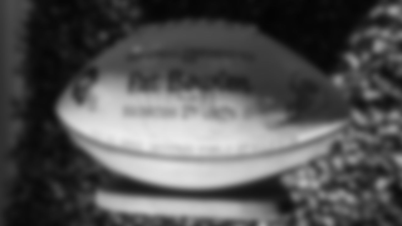 Mr. Bowlen's game ball from the Broncos' November 20, 2005, victory over the Jets is featured in a display at the open-house tribute to Pat Bowlen at Broncos Stadium at Mile High on June 18, 2019.