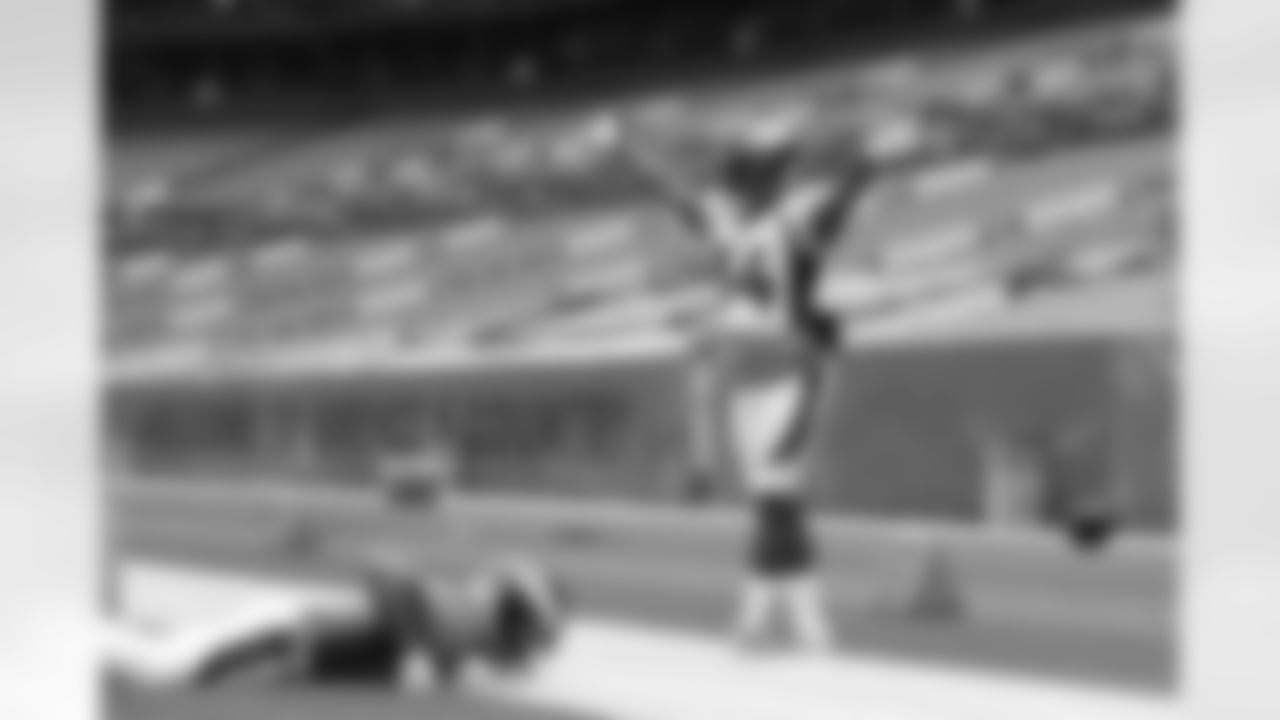 Essang Bassey signals for an incompletion during practice on Day 12 of training camp at Empower Field at Mile High on August 29, 2020. (Photo by Ben Swanson)