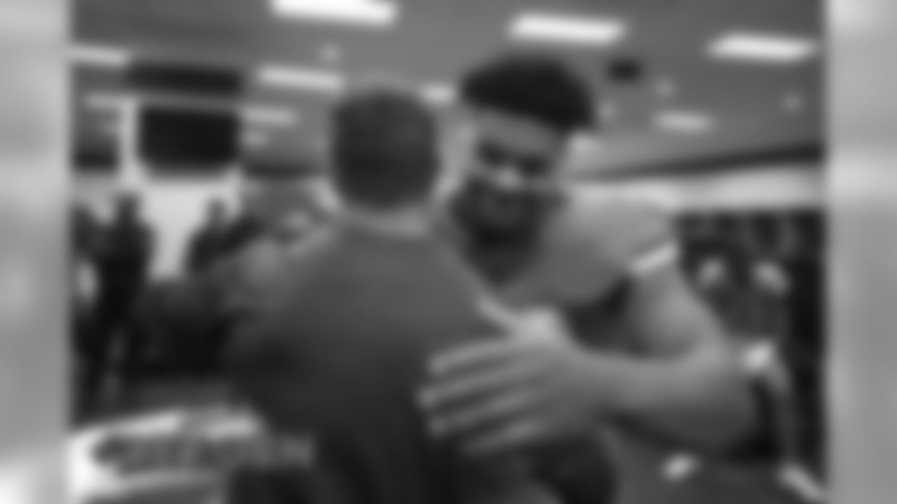 Dre'Mont Jones inside a jubilant locker room the Broncos' game against the Detroit Lions at Empower Field at Mile High on December 22, 2019. (Photo by Gabriel Christus)