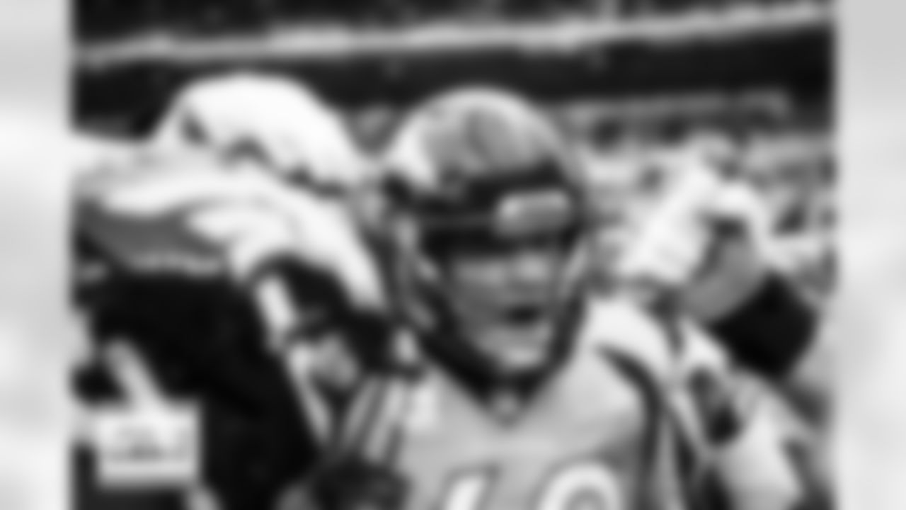 Denver Broncos offensive tackle Mike McGlinchey (69) gives a pregame speech before the Broncos' Week 8 game against the Kansas City Chiefs at Empower Field at Mile High in Denver, Colorado on October 29, 2023. Photo by Ben Swanson / Denver Broncos