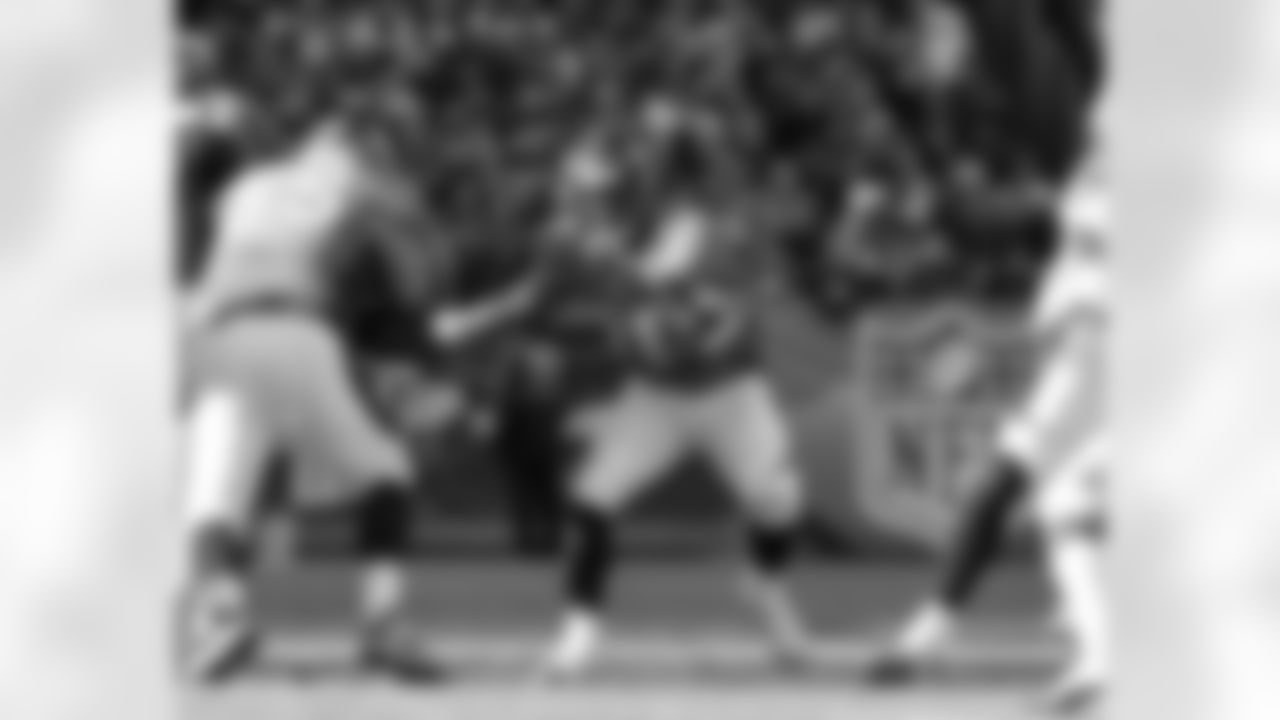Moreno looks for running room in the Browns defense.