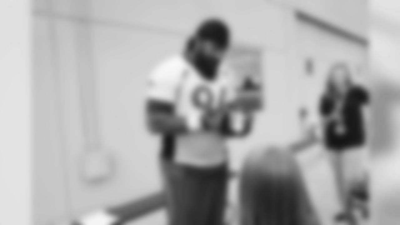 Children's Hospital Colorado junior reporter Kaylea interviews Domata Peko Sr. after practice on September 5, 2018 at UCHealth Training Center.