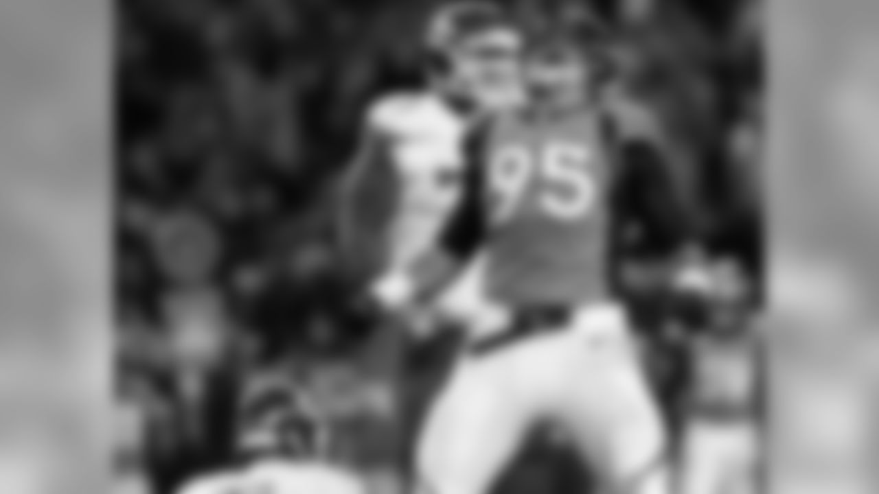 Denver Broncos defensive end Derek Wolfe (95) reacts after sacking Kansas City Chiefs quarterback Alex Smith (11) during third quarter action of the NFL game against the Kansas City Chiefs on Sunday Nov. 17, 2013 at Sports Authority Field at Mile High in Denver, Colorado.
(Photo by: Gabriel Christus)