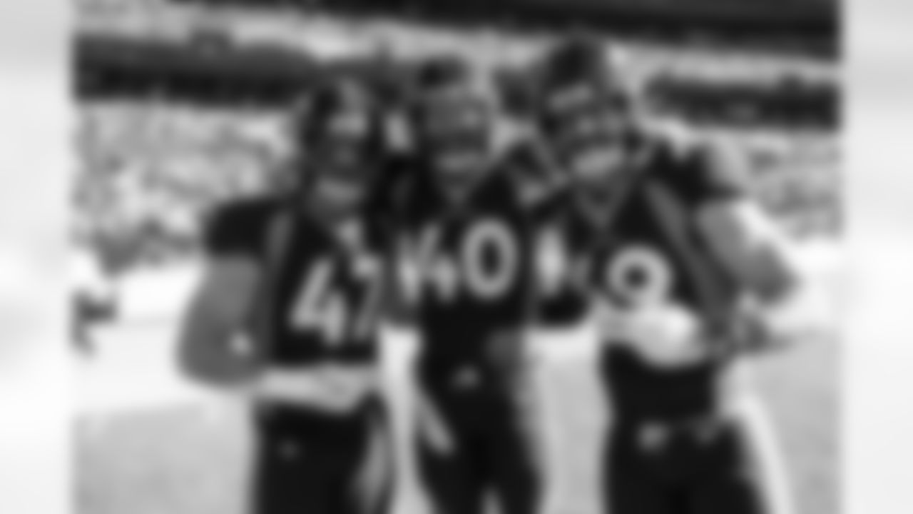Josey Jewell, Justin Strnad and Alex Singleton during pregame warmups before the Broncos' Week 14 game against the Kansas City Chiefs at Empower Field at Mile High in Denver, Colorado on December 11, 2022. (Photo by Ben Swanson)