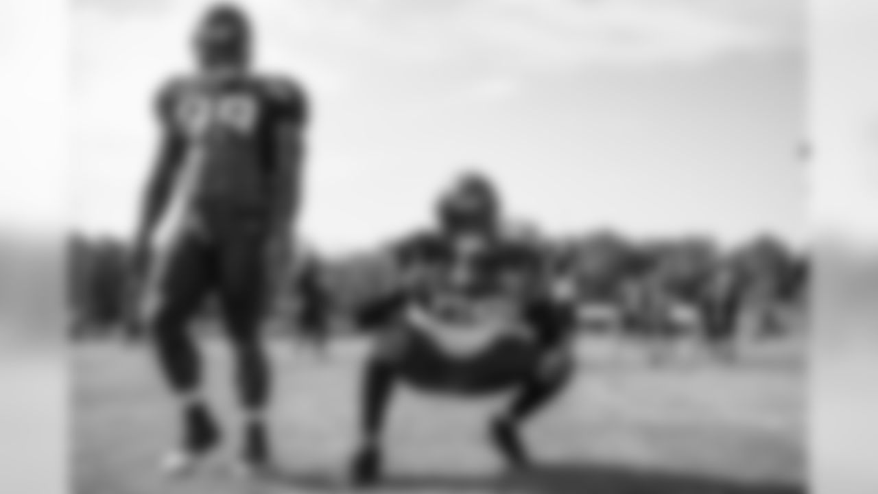 Linebacker Christian Kirksey (58) and Defensive tackle Devaroe Lawrence (99) during the eleventh day of training camp on August 5, 2019.