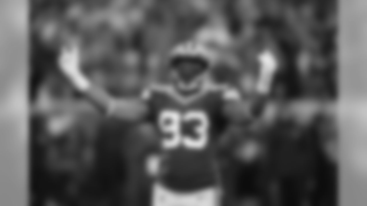 Green Bay Packers linebacker B.J. Goodson (93) urges the crowd to make noise prior to a kickoff during an NFL divisional playoff football game against the Seattle Seahawks, Sunday, Jan. 12, 2020, in Green Bay, Wis. The Packers defeated the Seahawks 28-23. (Joe Robbins via AP)