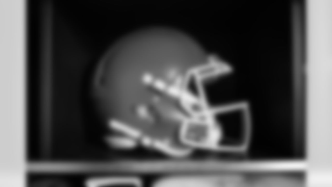 White facemask locker room setup at FirstEnergy Stadium on December 13, 2022.