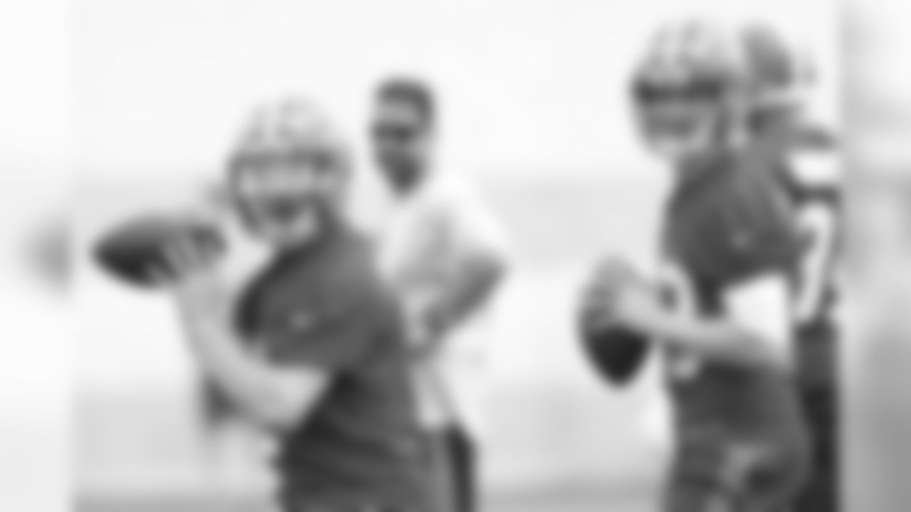 Quarterbacks Johnny Manziel (2) and Josh McCown (13) participate in the first Browns OTA of the 2015 season.
