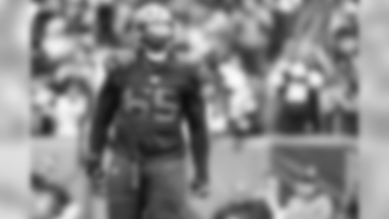 Defensive tackle Larry Ogunjobi (65)