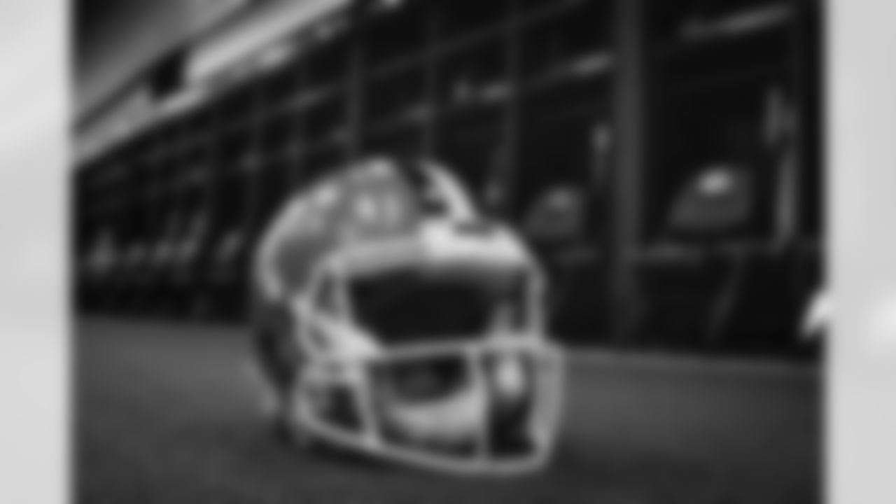 White facemask locker room setup at FirstEnergy Stadium on December 13, 2022.
