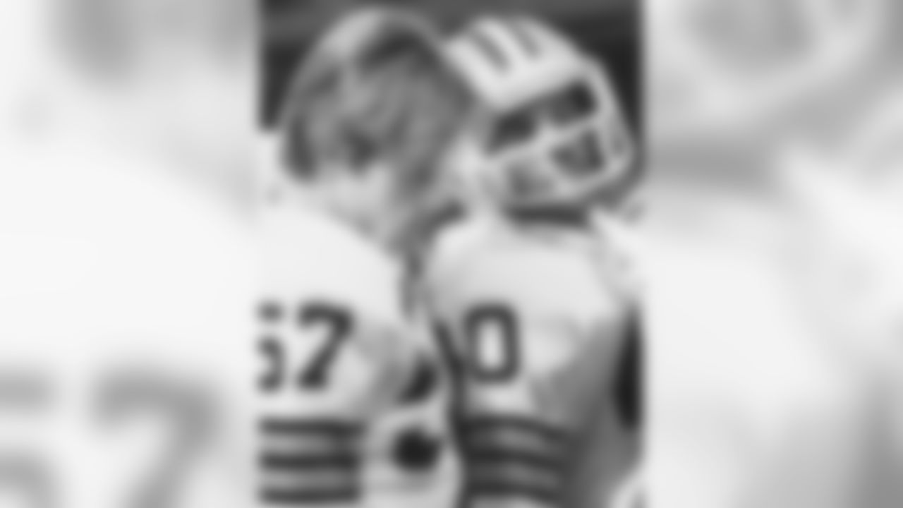 Tom London, pictured with rookie Clay Matthews, wore the number in 1978.
