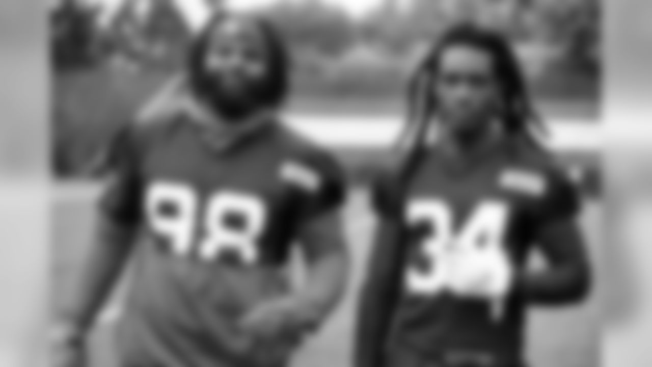 Defensive tackle Sheldon Richardson (98) and Cornerback Robert Jackson (34) during the ninth practice of OTAs on May 30, 2019.