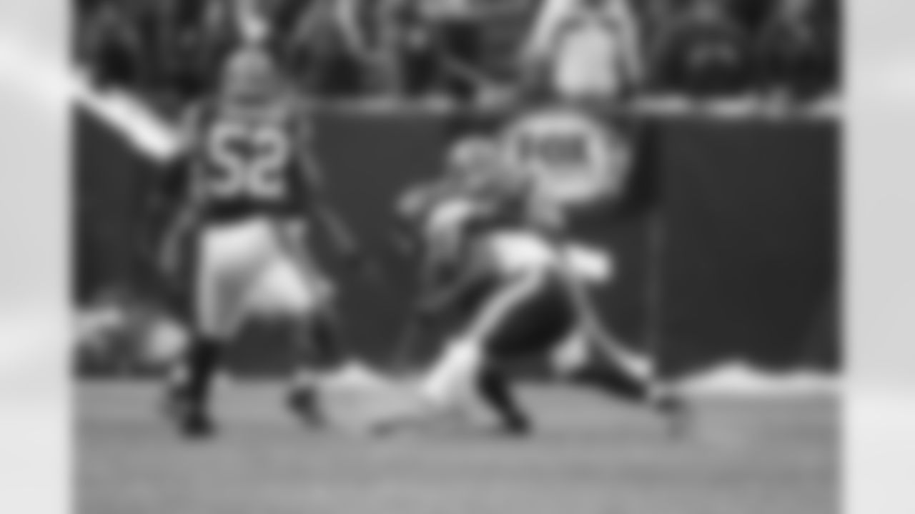 Craig Robertson registers one of his four tackles of the game against the Bears