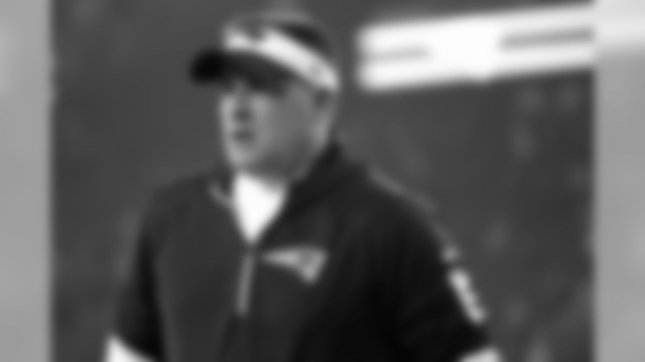 FILE - In this Jan. 4, 2020, file photo, New England Patriots offensive coordinator Josh McDaniels watches his team warm up before an NFL wild-card playoff football game against the Tennessee Titans, in Foxborough, Mass. With the Carolina Panthers and New York Giants completing coaching hires on Tuesday, Jan. 7, 2020, the Cleveland Browns job vacancy will be the last NFL opening filled. It's still unclear how quickly that will happen. The Browns, who fired Freddie Kitchens after just one season, are in the second week of interviews and have scheduled meetings this week with Patriots offensive coordinator Josh McDaniels and Vikings coordinator Kevin Stefanski. (AP Photo/Elise Amendola, File)