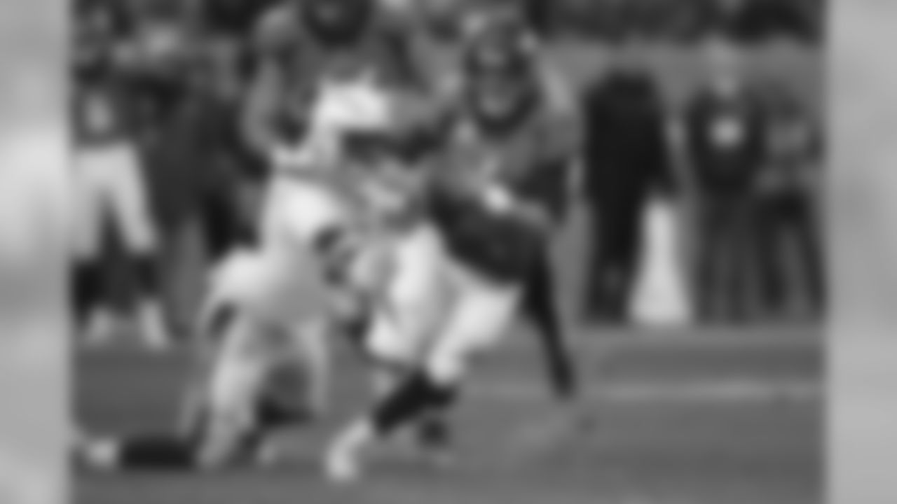 Denver Broncos quarterback Case Keenum runs with the ball during the first half of an NFL football game against the Los Angeles Chargers, Sunday, Dec. 30, 2018, in Denver. (AP Photo/David Zalubowski)