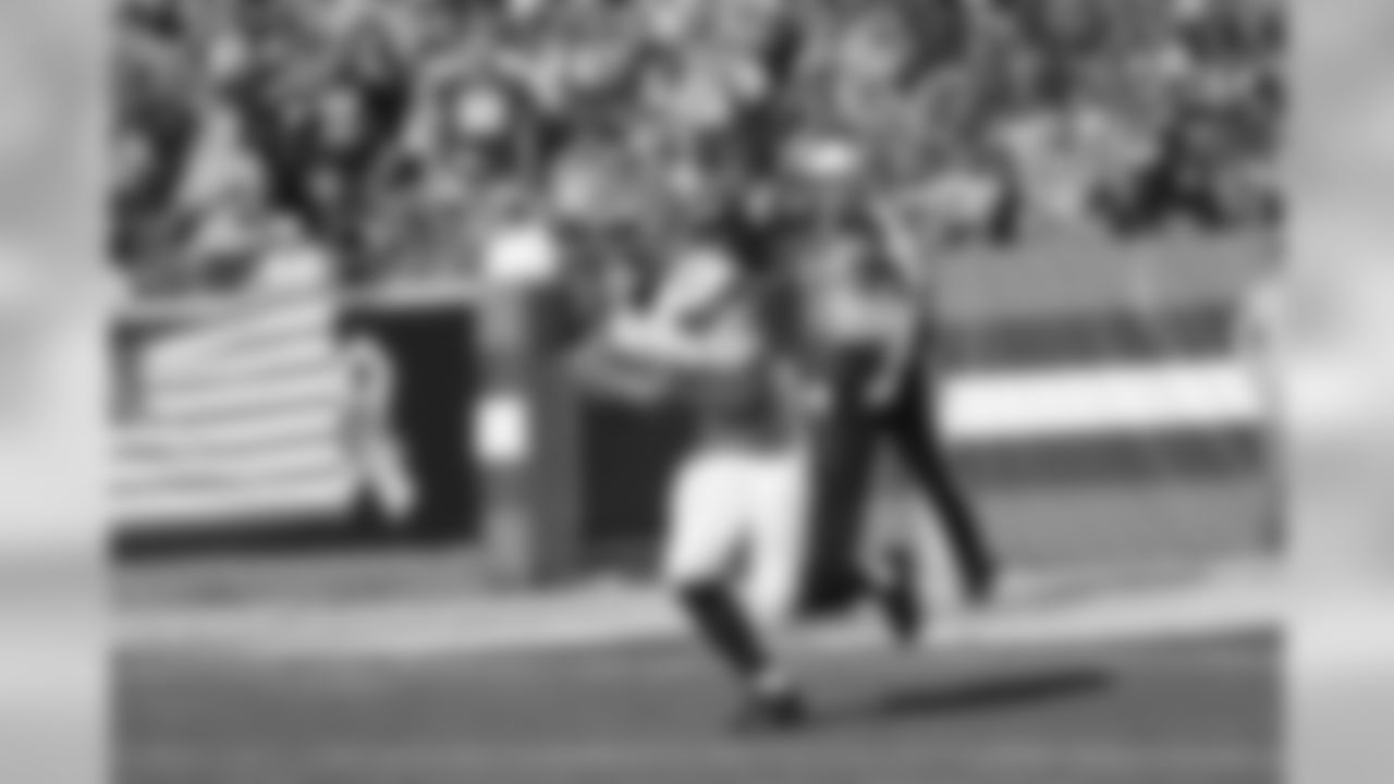 RB George Atkinson III makes a punt return.