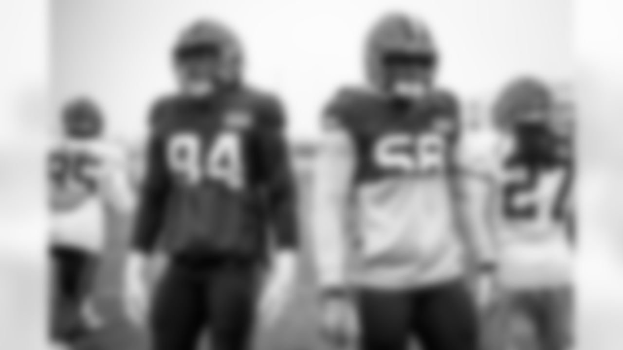 Defensive end Alex Wright (94) and Defensive end Isaiah Thomas (58) during practice at CrossCountry Mortgage Campus on December 7, 2022.