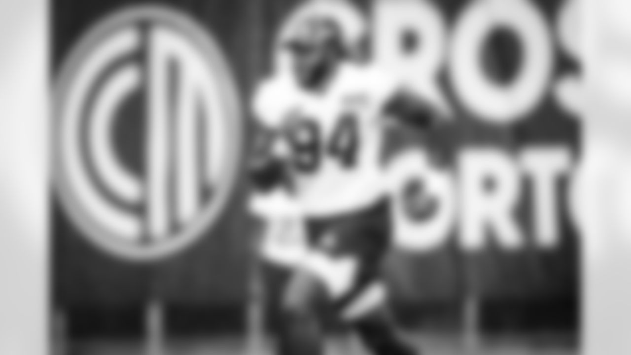 Defensive end Alex Wright (94) during the first day of rookie and quarterback workouts at CrossCountry Mortgage Campus on July 23, 2022.