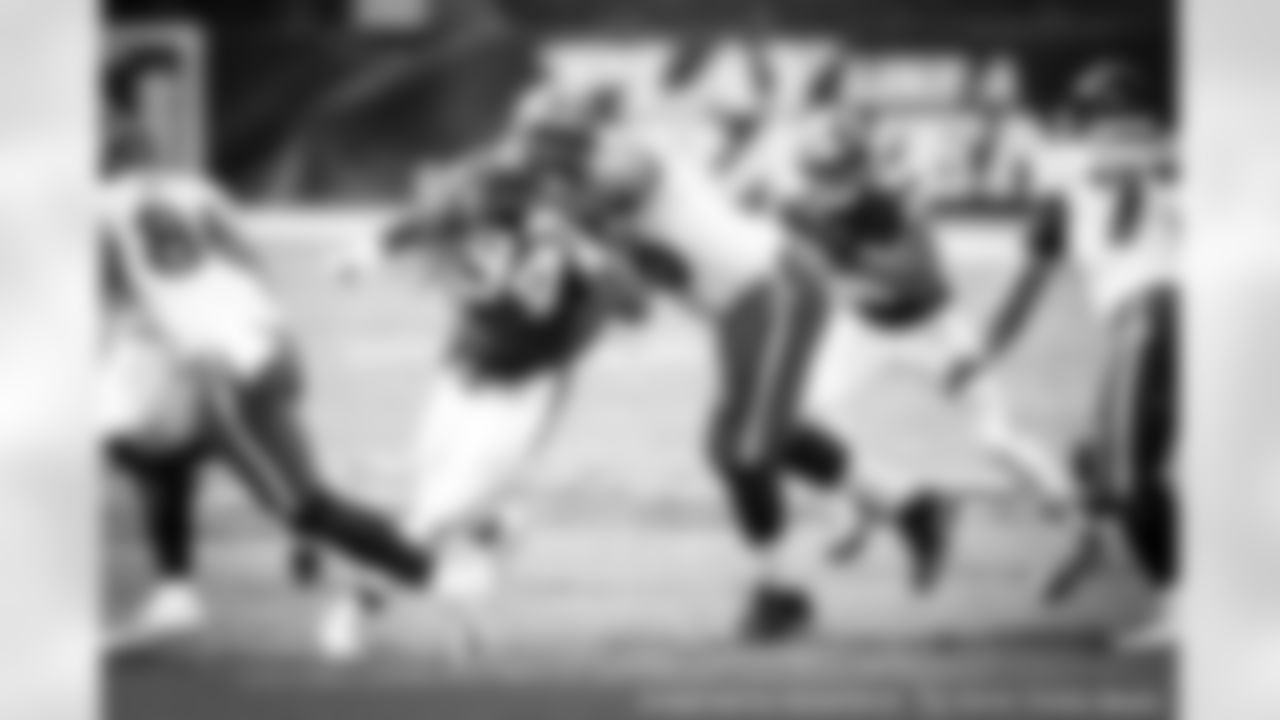 Defensive end Adrian Clayborn (94)