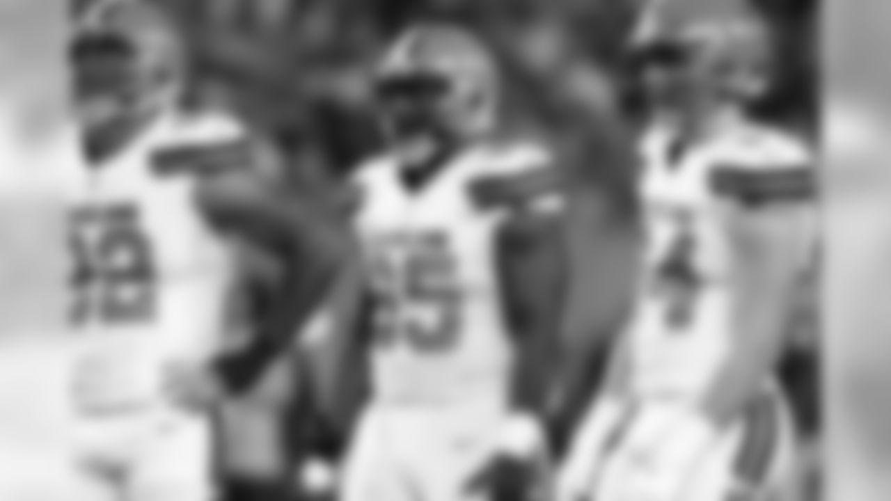 DL Larry Ogunjobi (middle) waits for the next play.
