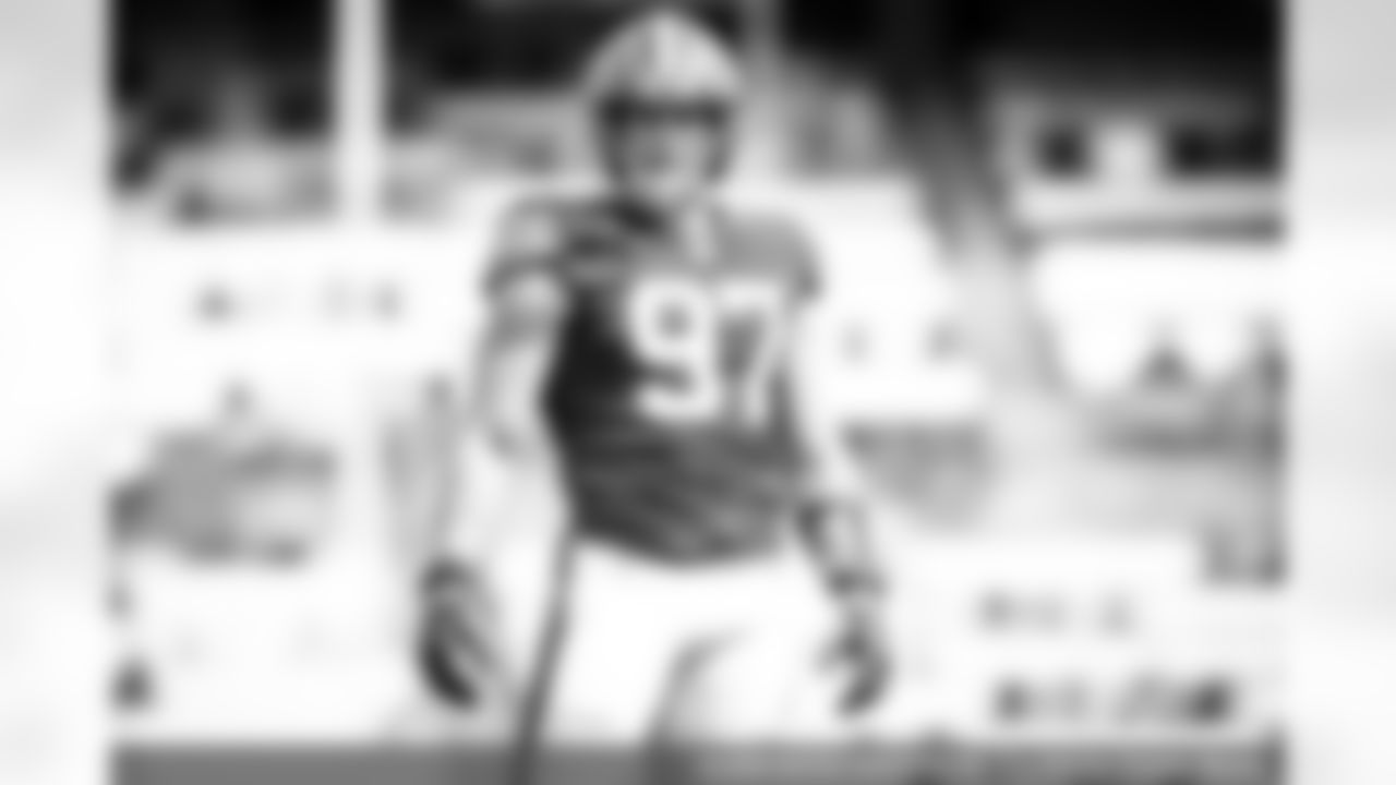 Defensive end Porter Gustin (97)
