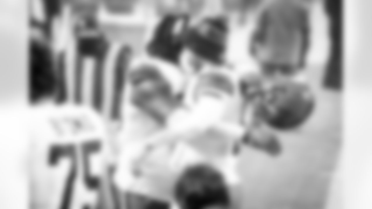 Defensive tackle Sheldon Richardson (98) and Quarterback Baker Mayfield (6) after a NFL divisional round playoff football game between the Cleveland Browns and Kansas City Chiefs on January 17, 2021 at Arrowhead Stadium. The Browns lost 17-22.