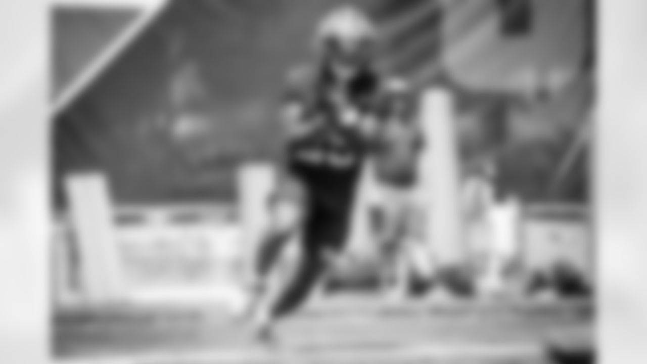 Running back Demetric Felton (25) during a quarterback/rookie practice on July 25, 2021.