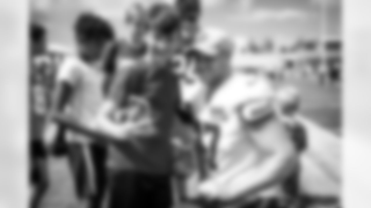 Long snapper Charley Hughlett (47) with fans during the ninth day of training camp at CrossCountry Mortgage Campus on August 6, 2022.