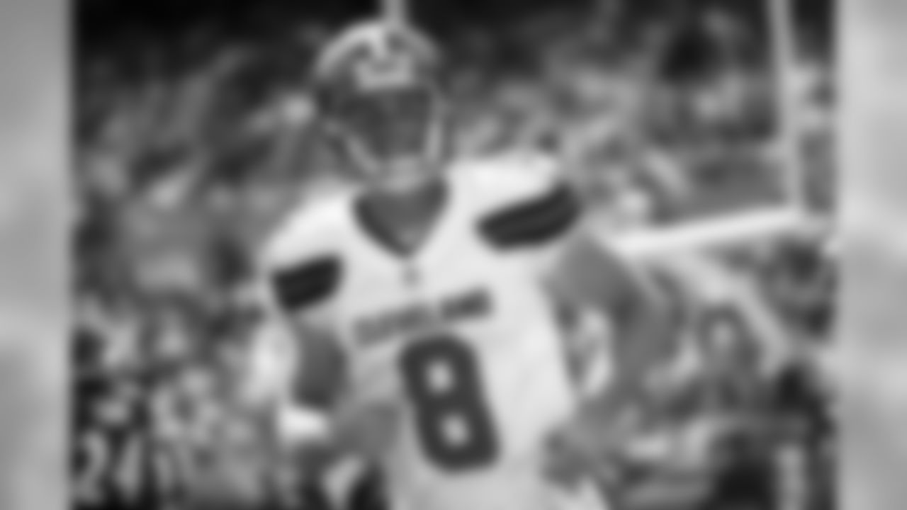 QB Kevin Hogan leaves the field during the first half.