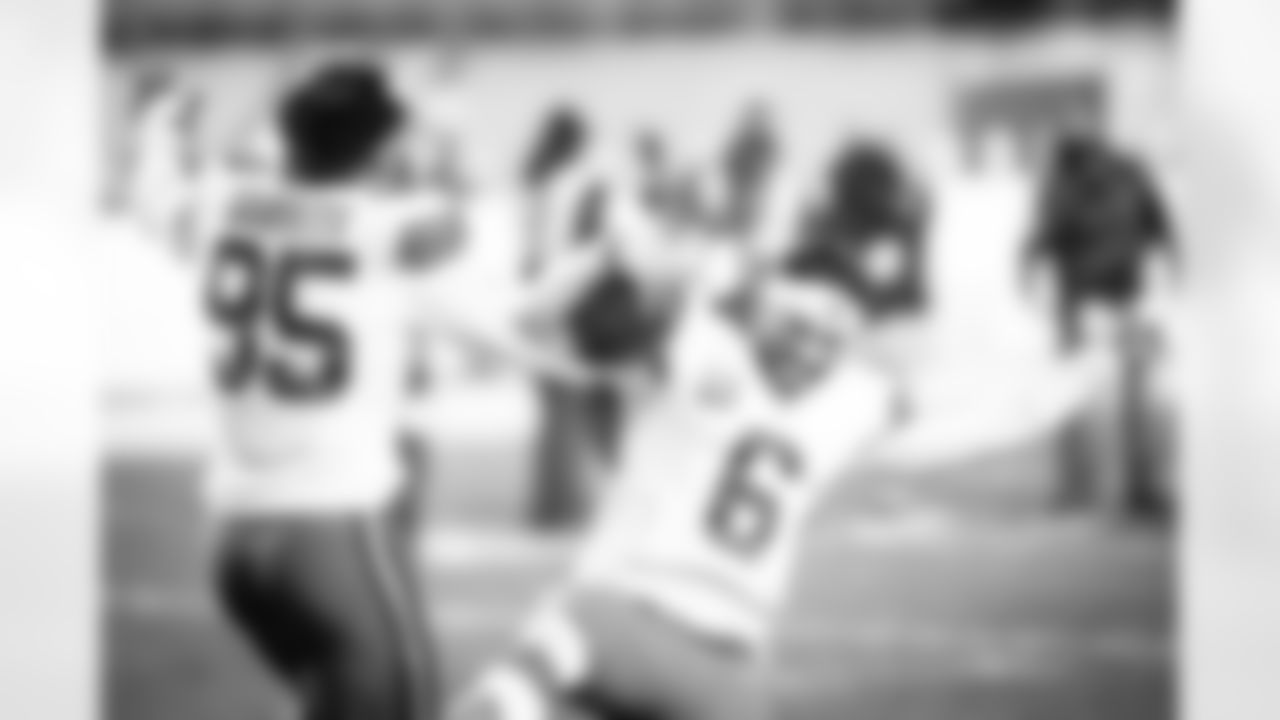 Defensive end Myles Garrett (95) and Quarterback Baker Mayfield (6) after a NFL wild-card playoff football game between the Cleveland Browns and Pittsburgh Steelers on January 10, 2021 at Heinz Field. The Browns won 48-37.