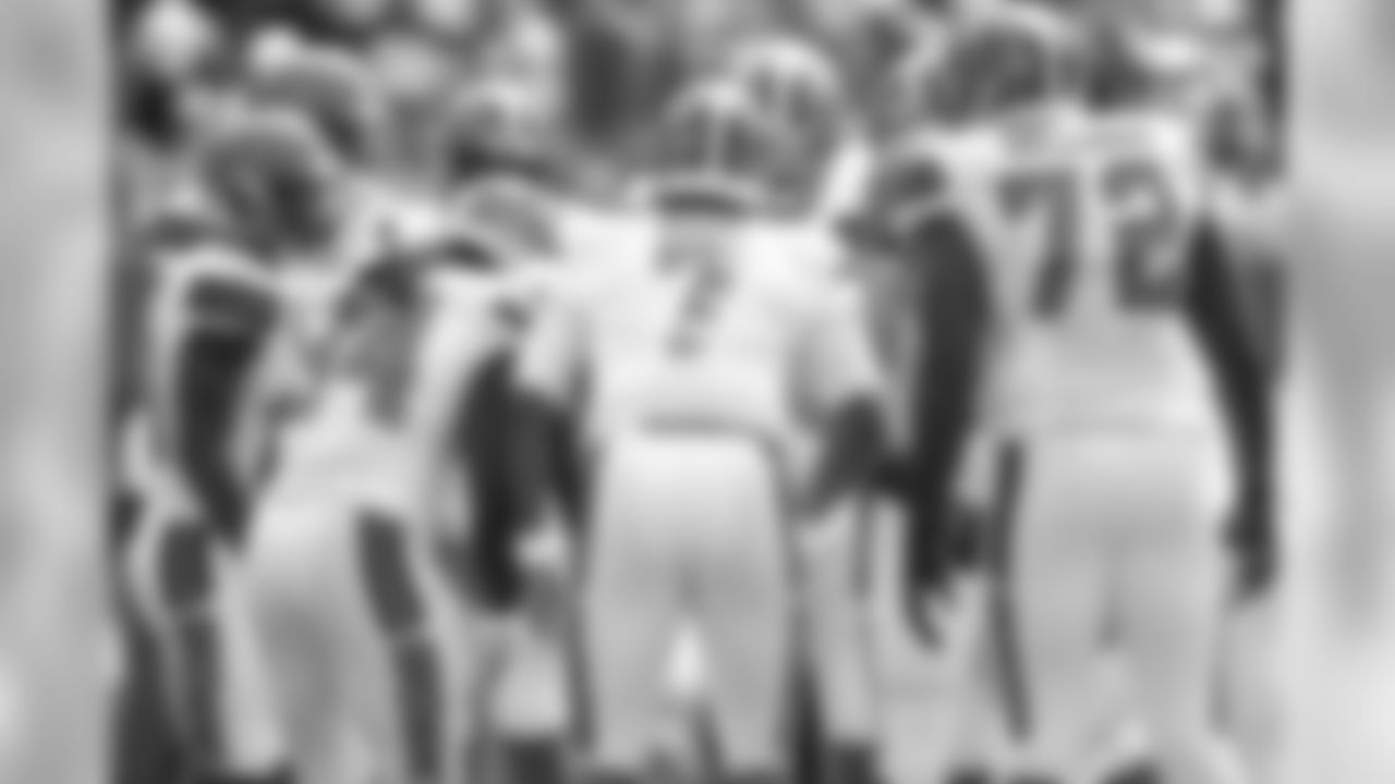 The Browns huddle up before a play.