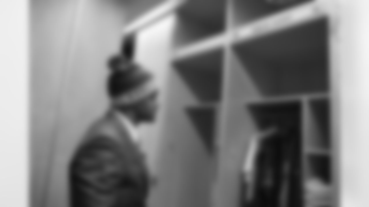 Karlos Dansby views his new locker for the first time